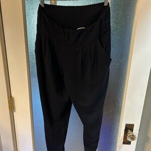 Black dressy sweatpants by encircled. Medium regular length